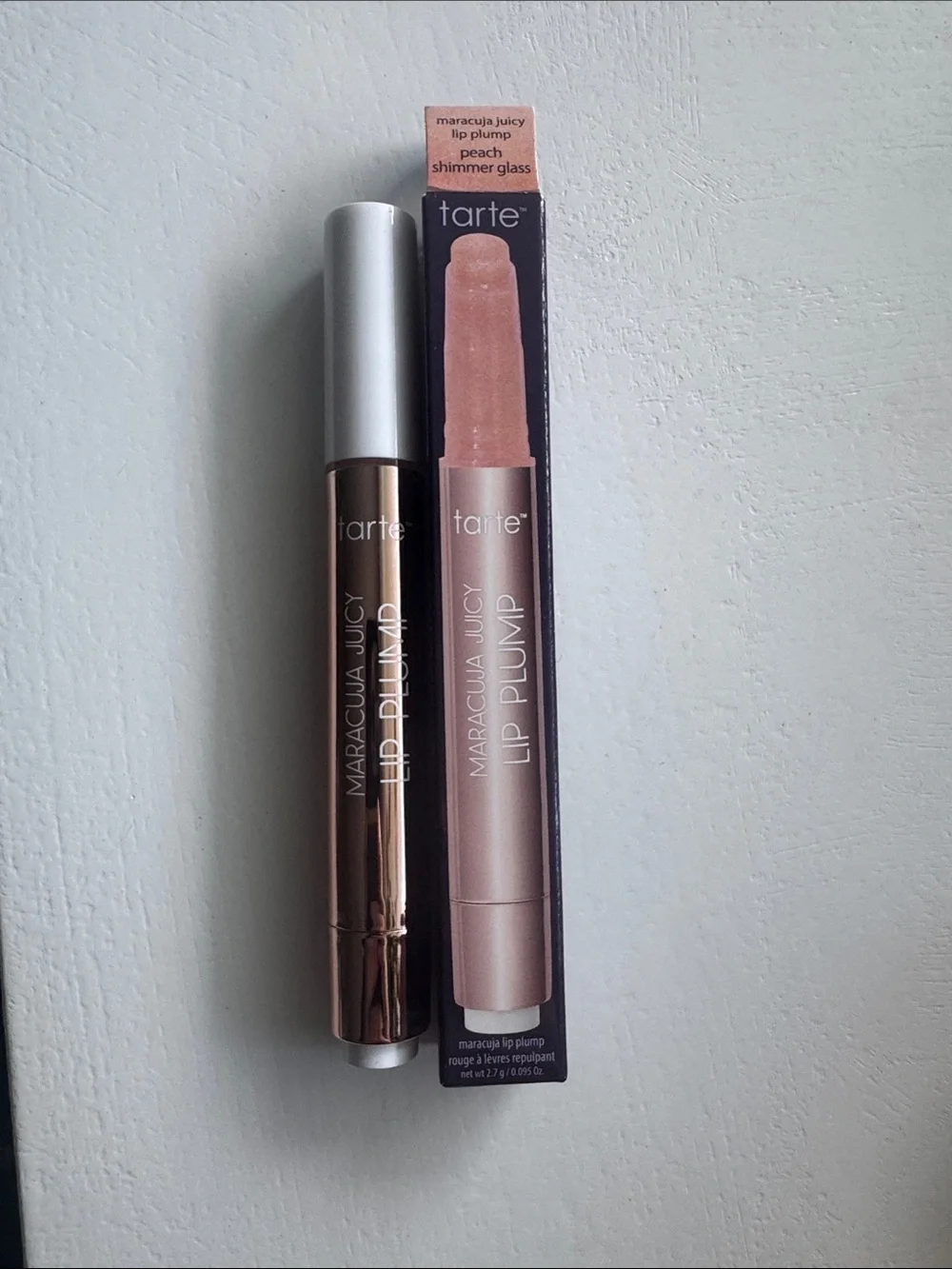 tarte Maracuja Juicy Lip Plump — peach shimmer glass